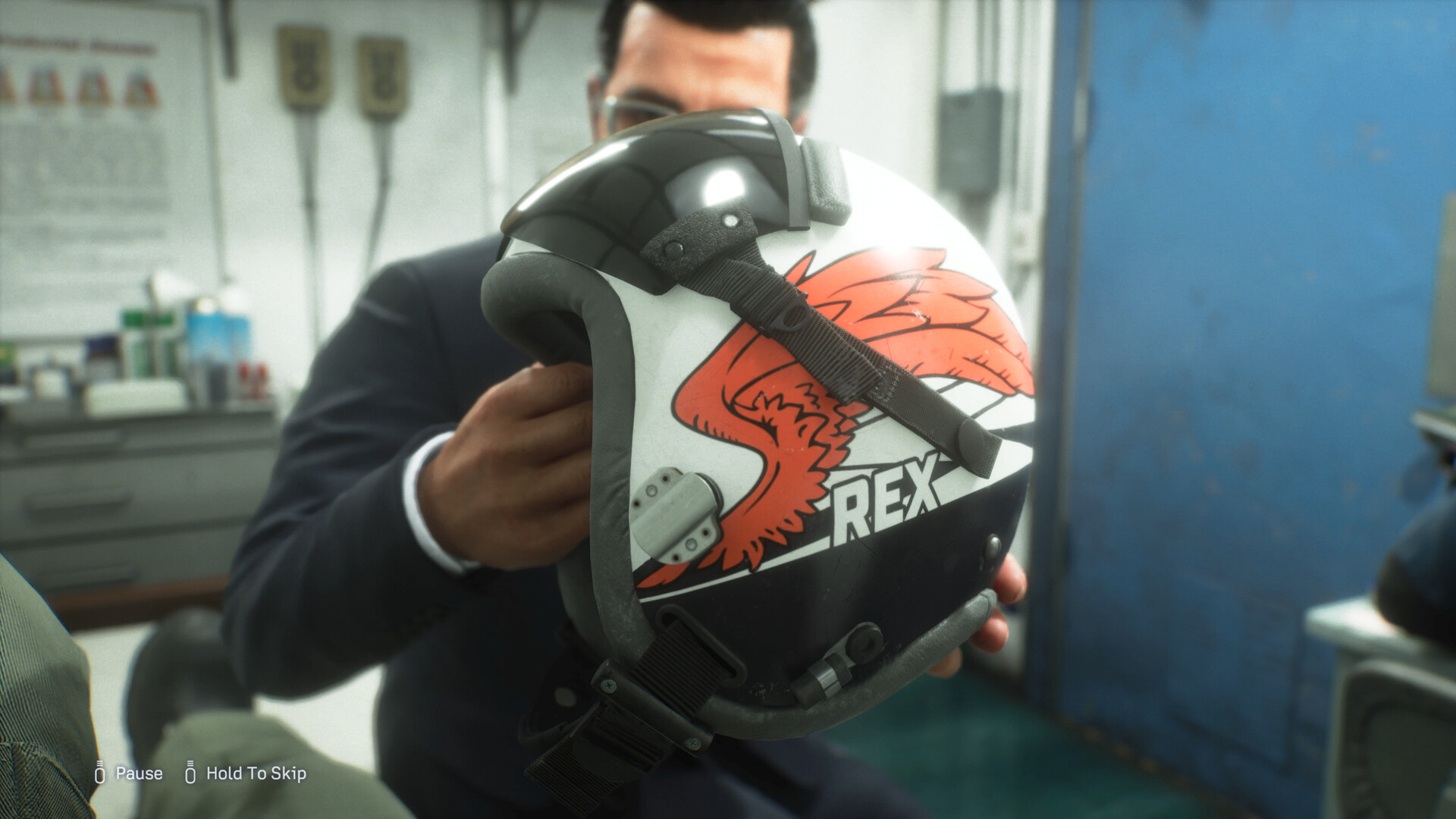 A pilot holding a helmet in Ace Combat 8: Wings of Theve