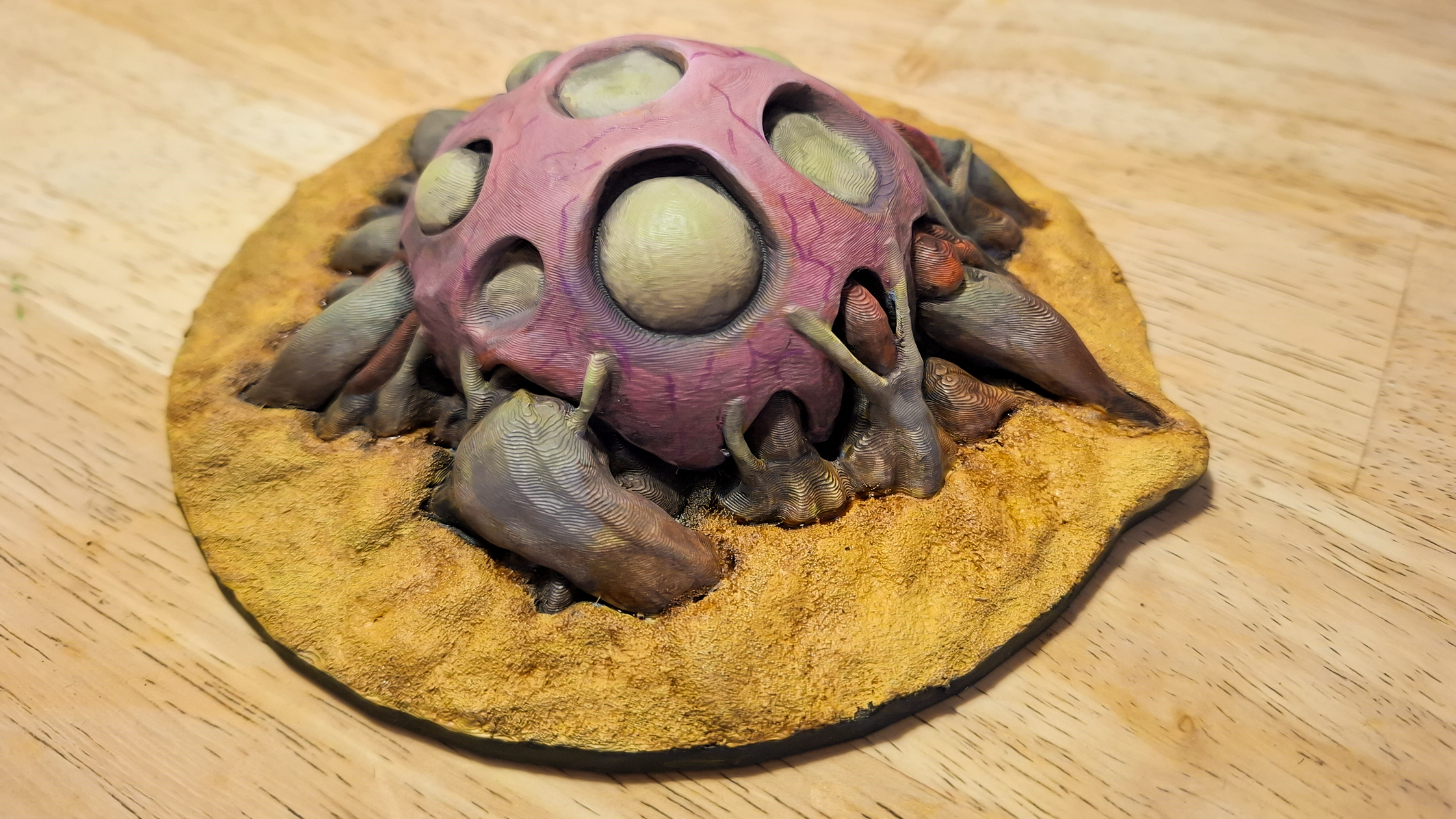 A painted 3D printed Factorio biter spawner