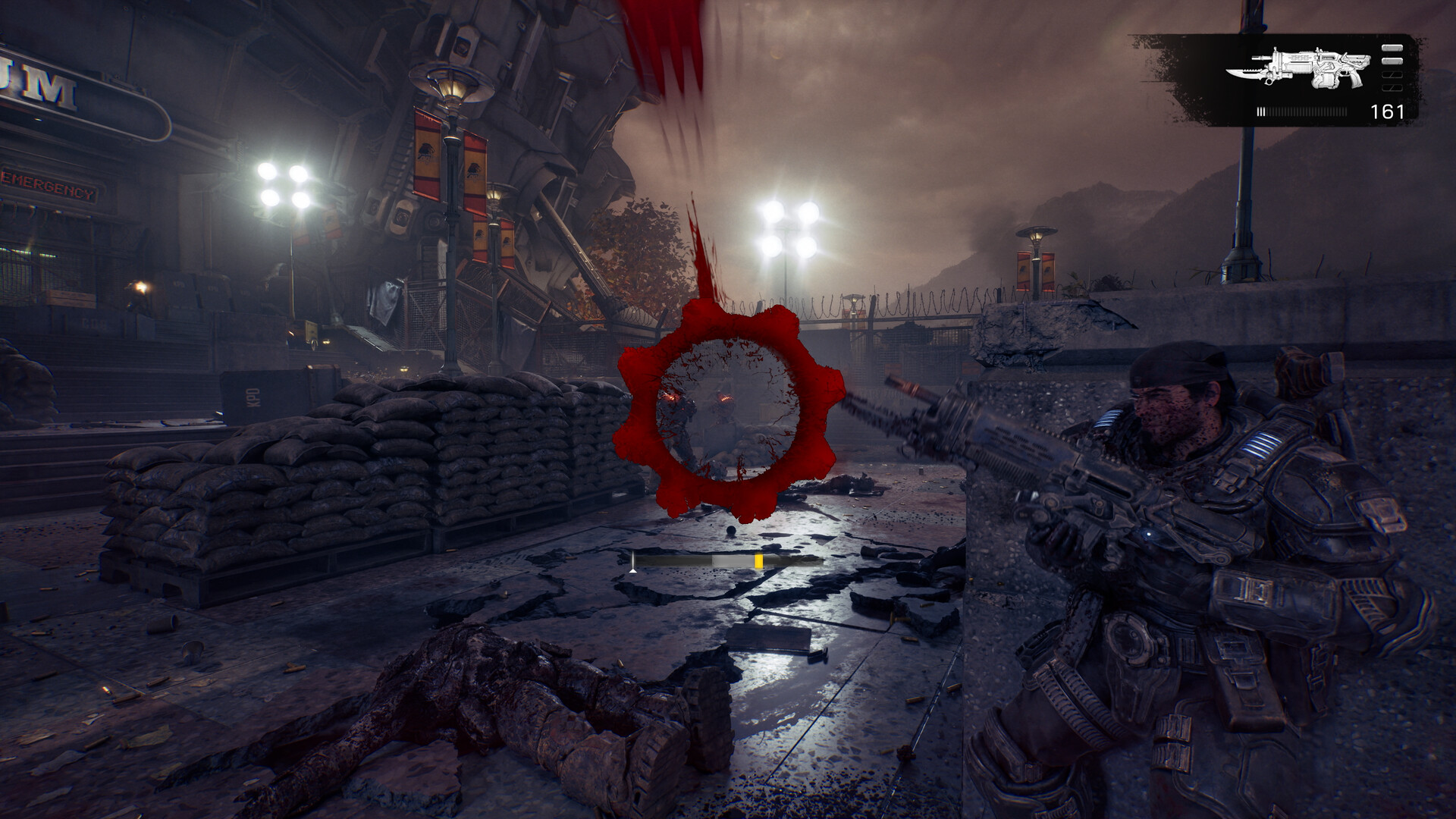 A squad in a ruined stadium in a Gears of War: E-Day screenshot