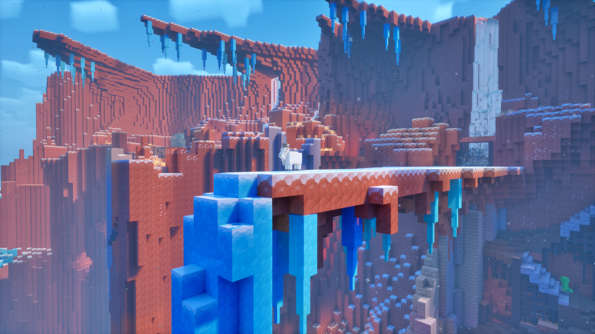 Red cliffs and blue ice in a Minecraft Dungeons II screenshot