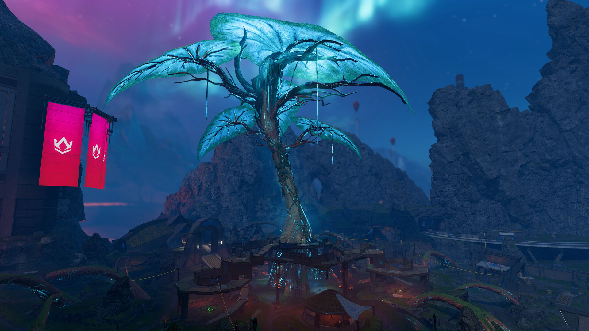 A Legend in blue and silver armour walks past a floating ice crystal while another in green and gold armour crouches in the foreground blowing a pink bubble, on a snowy map