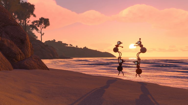 Two players stacked into wobbly towers on a beach at sunset, with bushy headland behind