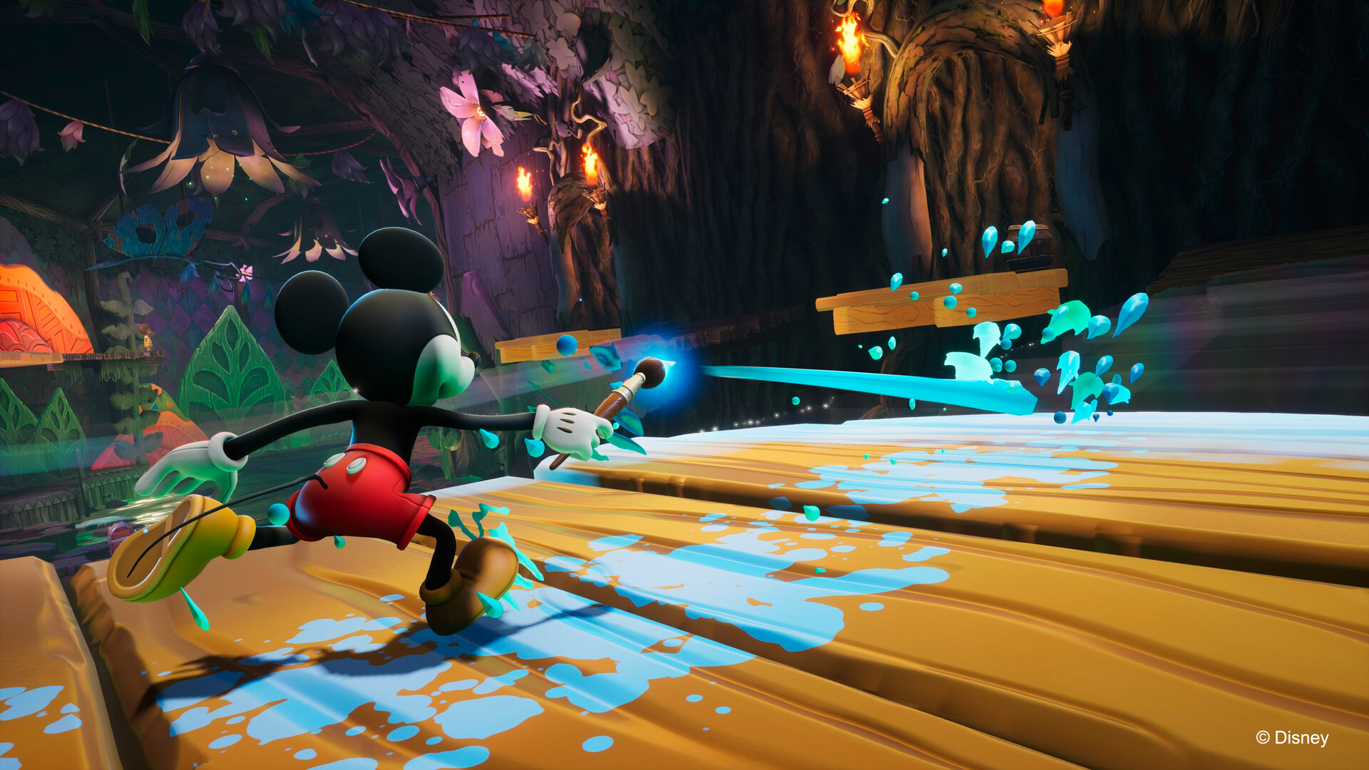 Mickey Mouse fires a stream of blue paint across a wooden walkway in Disney Epic Mickey: Rebrushed