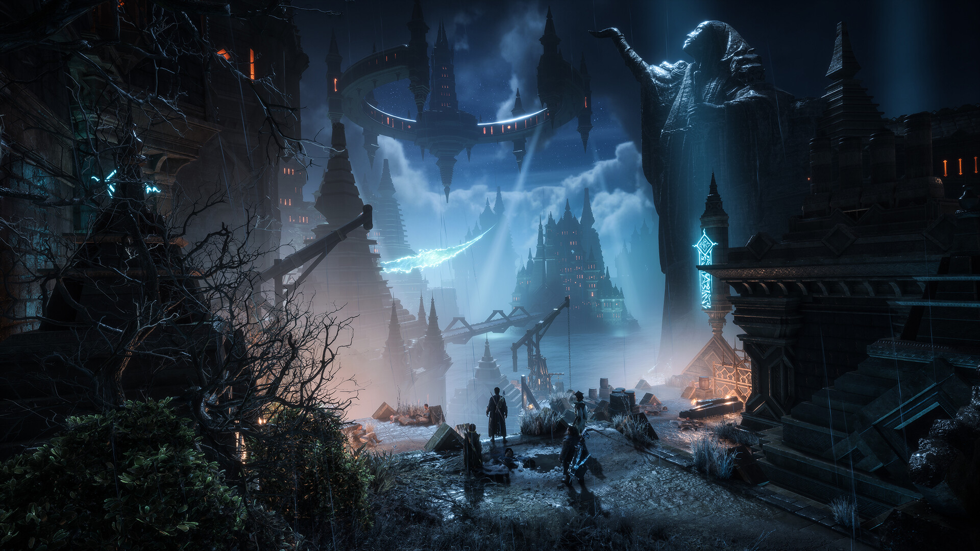 A Dragon Age: The Veilguard screenshot of a small party standing on a ledge at night, looking out over a city of dark spires and a giant statue with a raised hand.