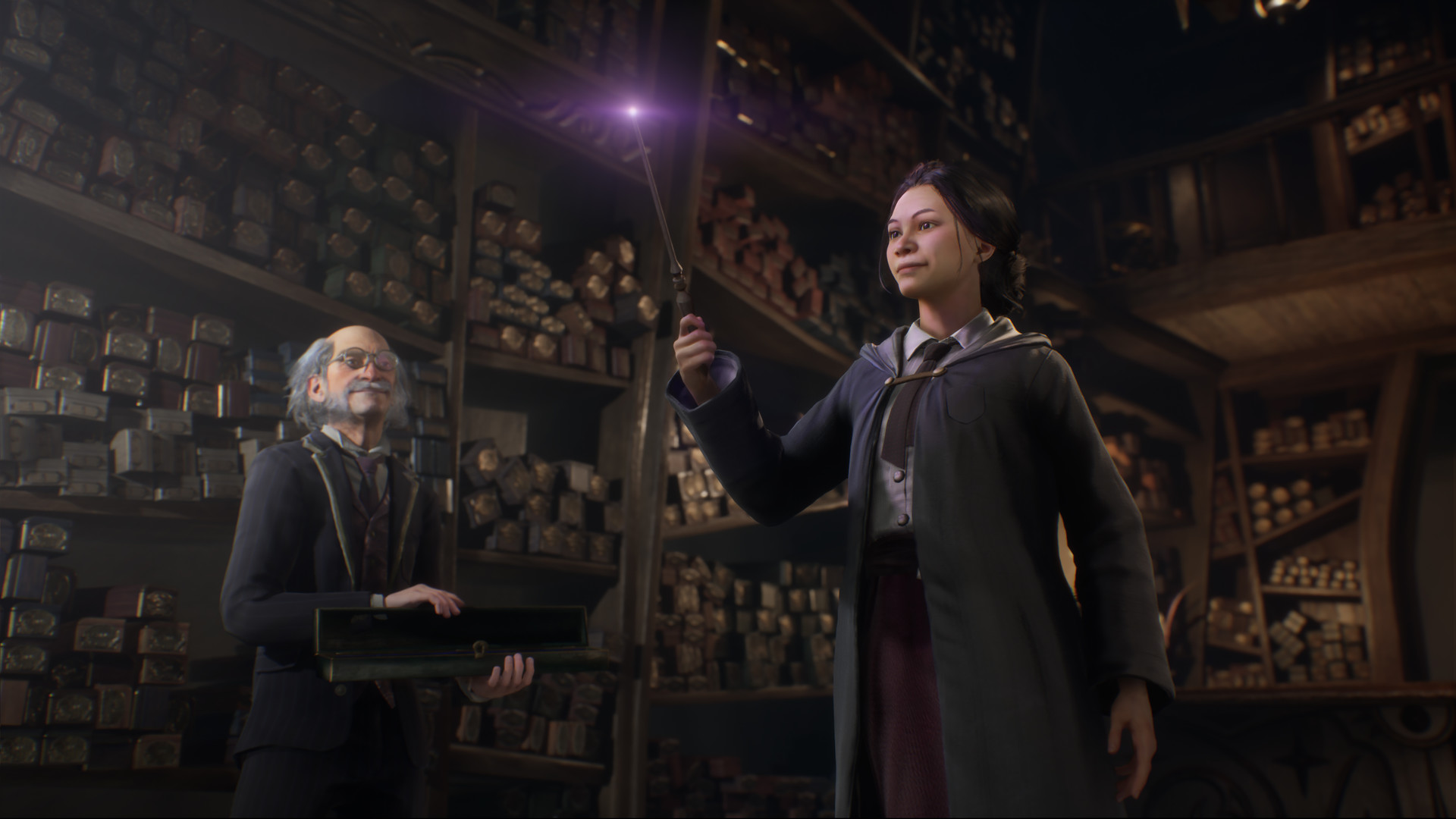 A student raising a glowing purple-tipped wand in a wand shop in Hogwarts Legacy, while an older shopkeeper holds an open wand case beside shelves of boxes.