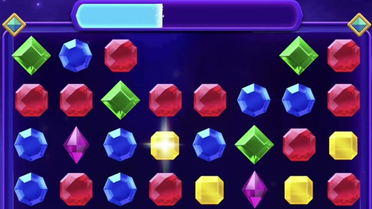 A Microsoft Jewel board of red, blue, green, yellow and purple gems under a progress meter