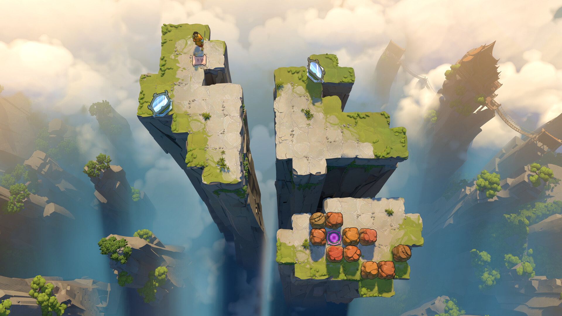 Grassy puzzle platforms on top of tall stone pillars above the clouds, with crystals and pushable blocks