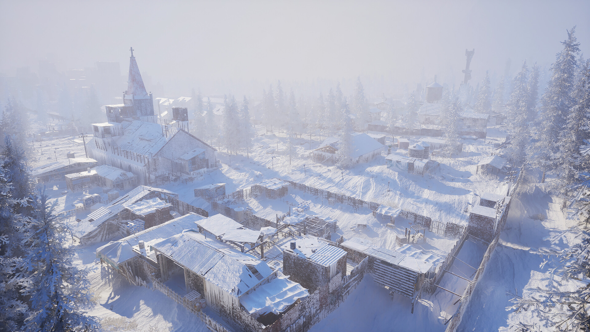 Aerial view of a snow-buried wooden town with a church spire, surrounded by snowy pine forest