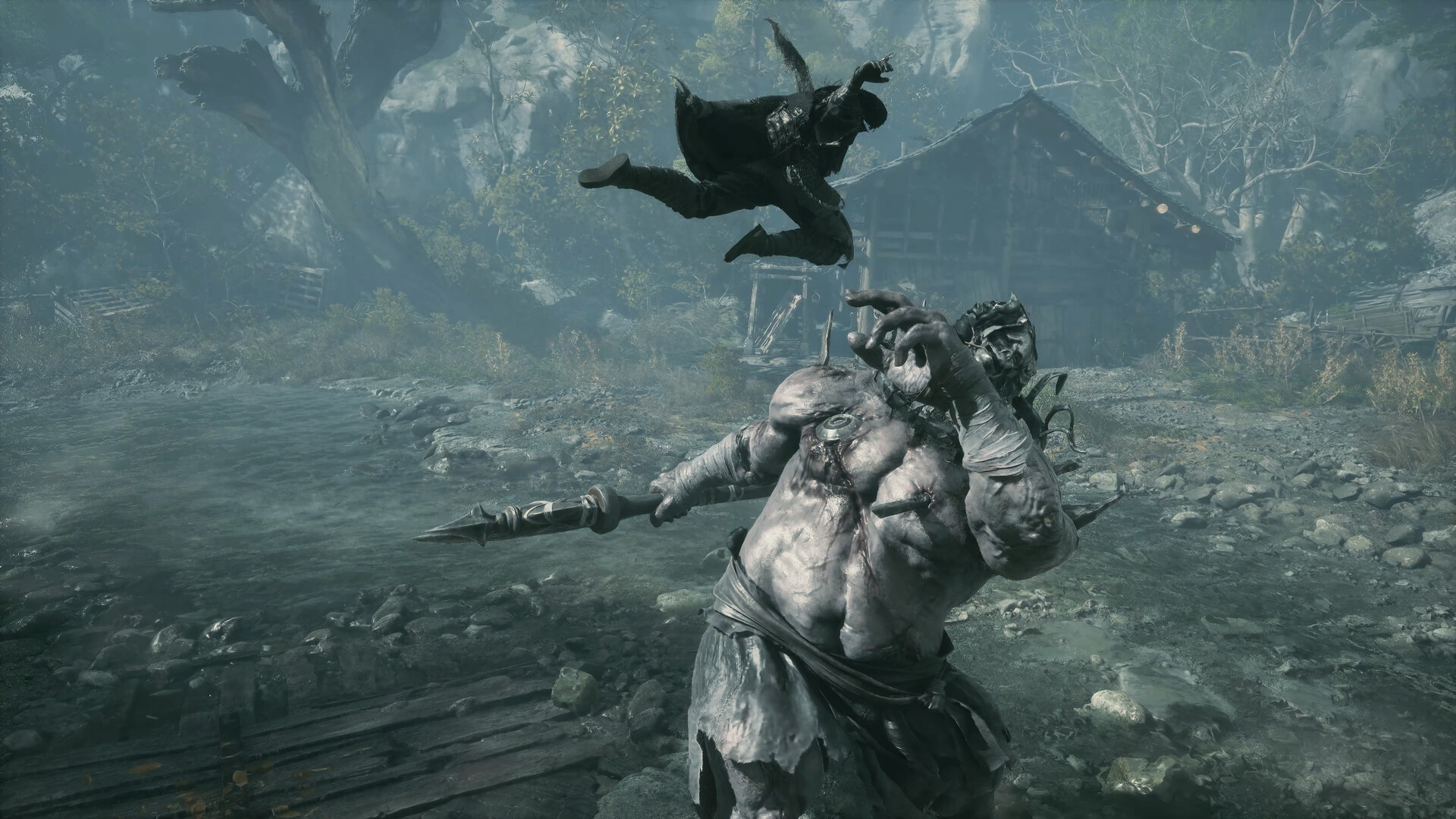A fighter leaps over a huge pale brute wielding a spear in a grey village in Phantom Blade Zero