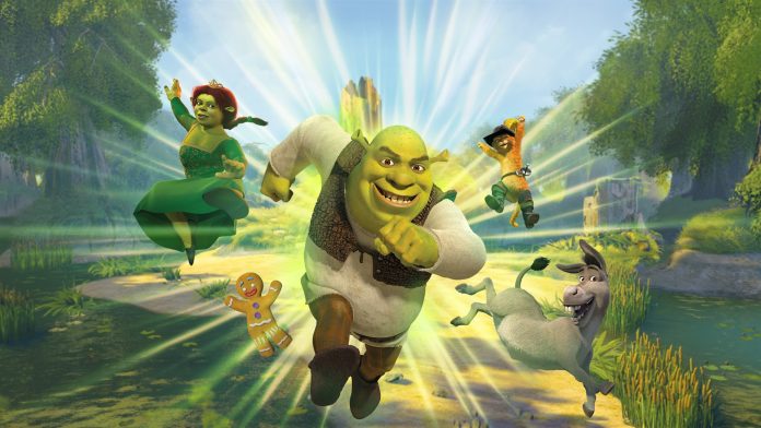 Shrek 2 Remastered key art: Shrek runs towards the viewer along a swamp path with Fiona, Puss in Boots, Donkey and Gingy around him.