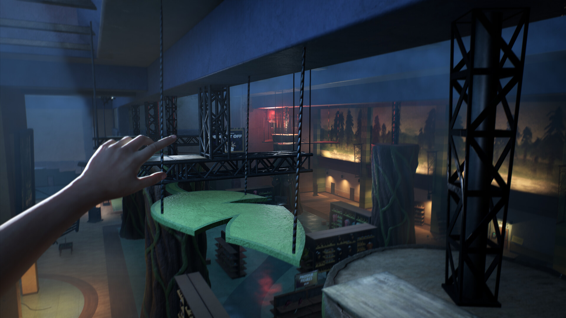 First-person view reaching towards hanging green platforms above a dark attraction floor in Terrible Lizards