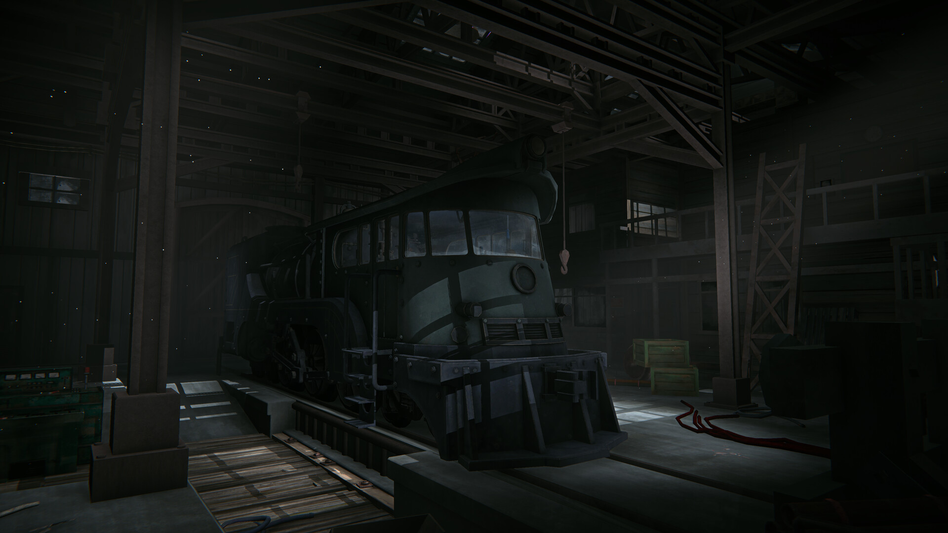 The Long Dark: Iron Road: an old locomotive sits in a dim timber engine shed