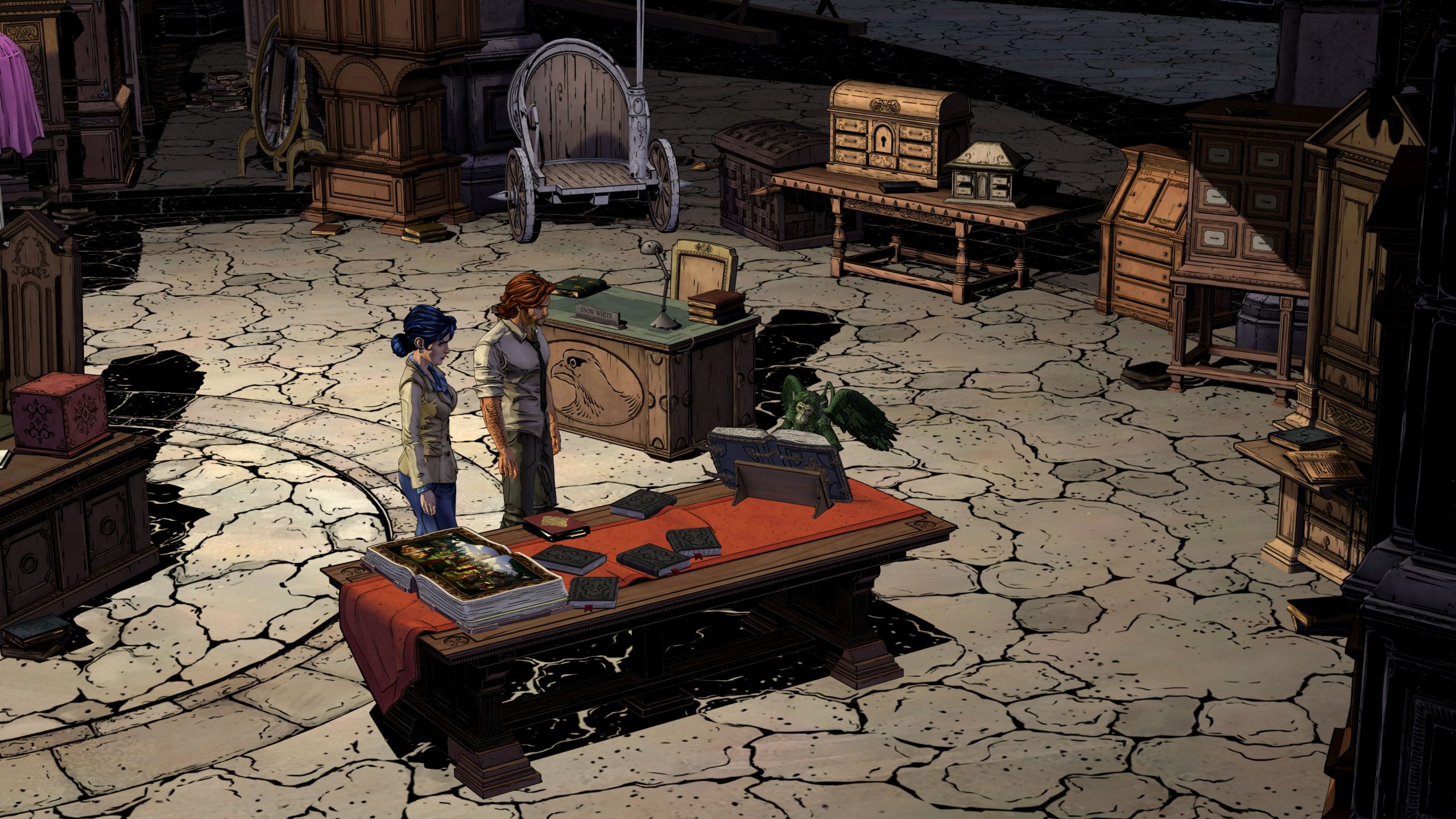 Overhead view of a cluttered office with a cracked floor, where two characters stand beside a large wooden desk